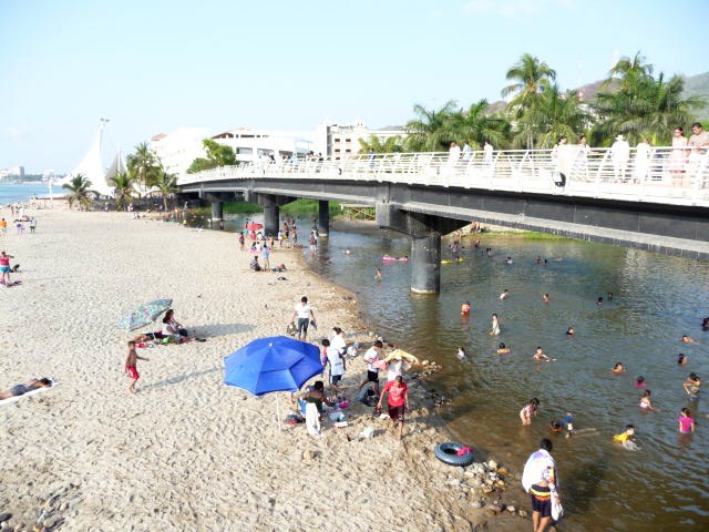 new malecon over the cuale river - gay puerto vallarta travel
